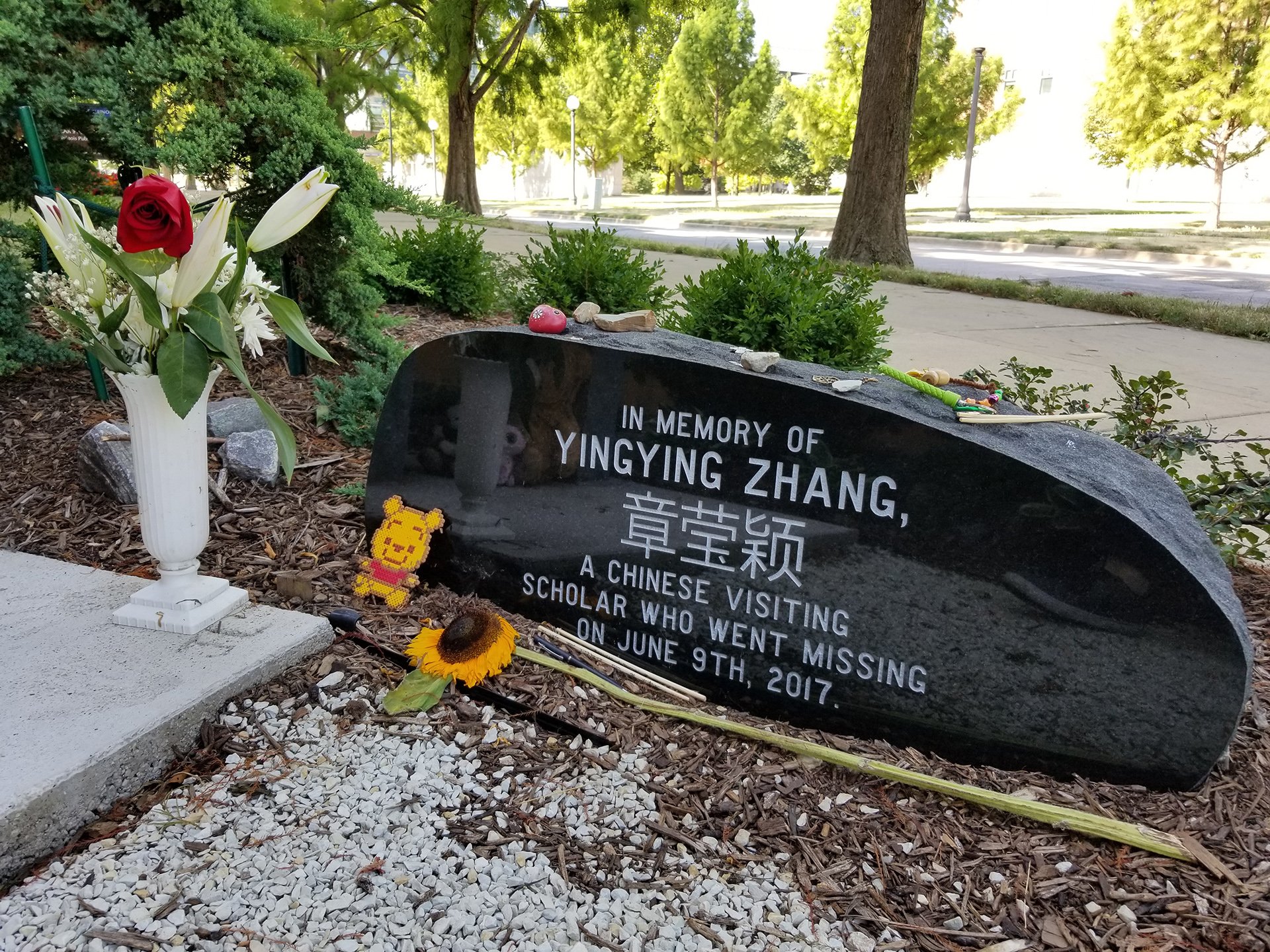 A memorial stone engraved with Yingying Zhang’s name in both English and Chinese on the campus of the University of Illinois at Urbana-Champaign on Aug. 7, 2019.  (Matt Masterson / WTTW News)