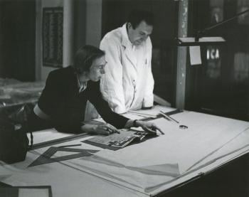 Edith Farnsworth consulting with Myron Goldsmith in the Mies office in 1950.