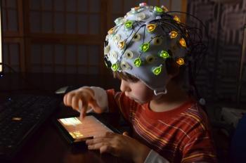 Children were monitored with EEGs while watching animated characters perform prosocial and antisocial behaviors, and later participated in a task measuring generosity; courtesy Jean Decety