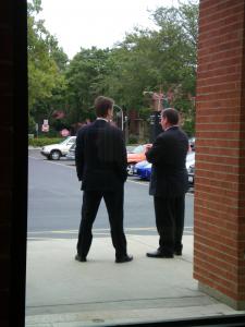 Security waits for the Mayor outside the studio. Click here for photos.