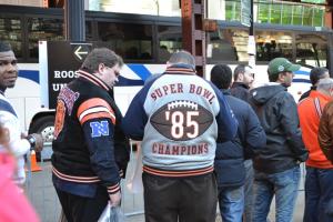 A couple of Chicago Bears fans wait in line for standby tickets before round one of the NFL Draft begins. 