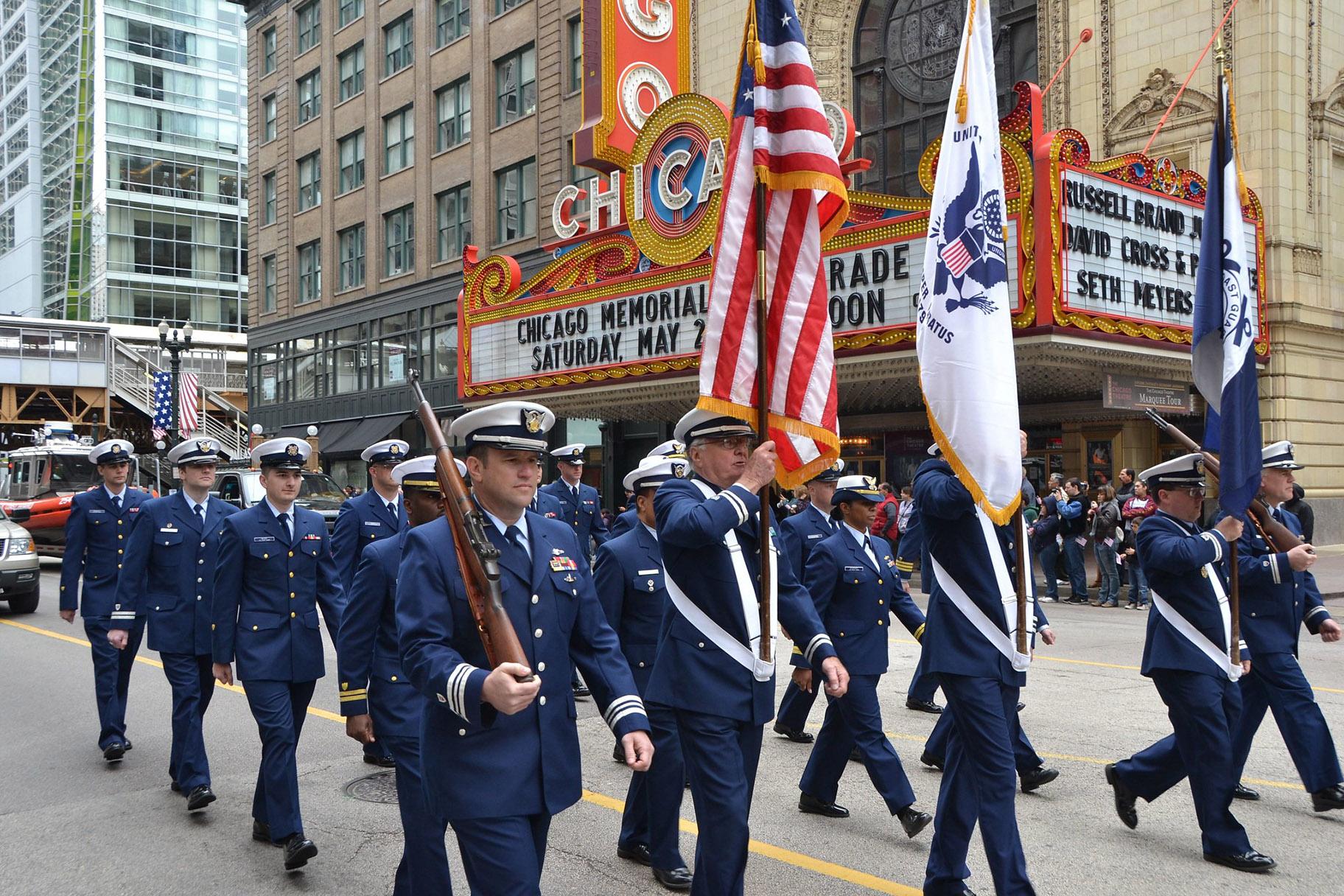 Members of the Coast Guard and Coast Guard Auxiliary march along State Street during the Chicago Memorial Day Parade on May 25, 2013. (Coast Guard News / Flickr)