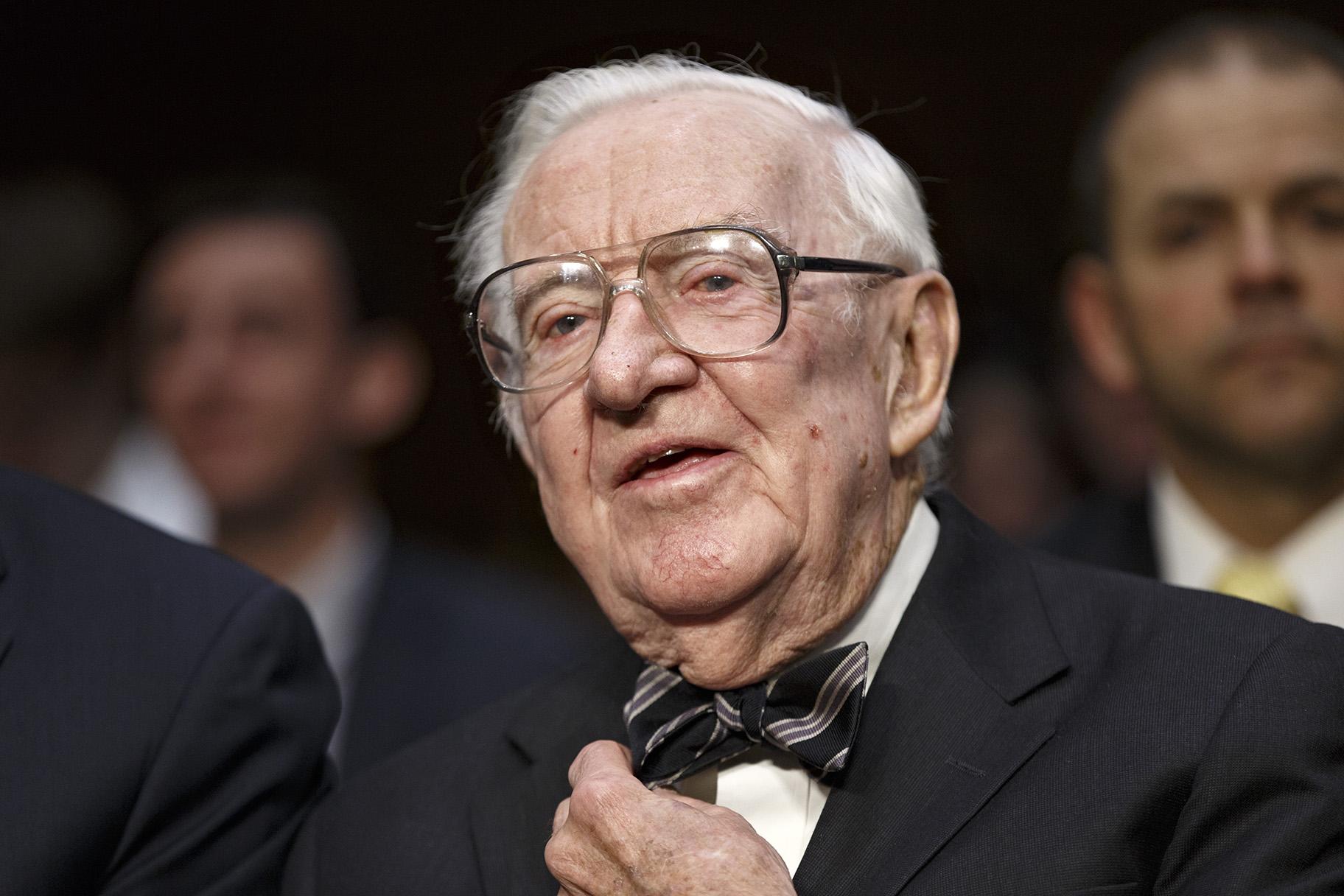 In this April 30, 2014 file photo, retired Supreme Court Justice John Paul Stevens prepares to testify on the ever-increasing amount of money spent on elections as he appears before the Senate Rules Committee on Capitol Hill in Washington. (AP Photo, File)