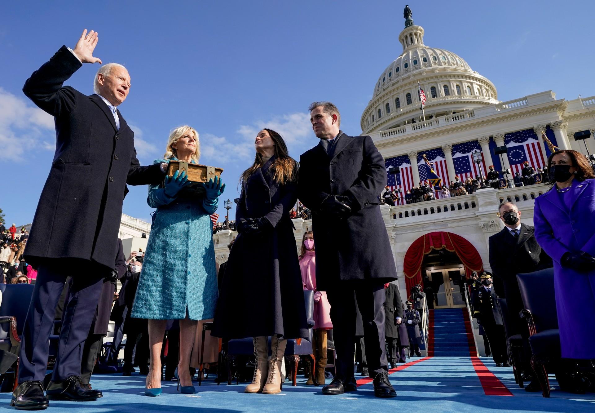 Joe Biden is sworn in as the 46th president of the United States by Chief Justice John Roberts as Jill Biden holds the Bible during the 59th Presidential Inauguration at the U.S. Capitol in Washington, Wednesday, Jan. 20, 2021, as their children Ashley and Hunter watch. (AP Photo / Andrew Harnik, Pool)