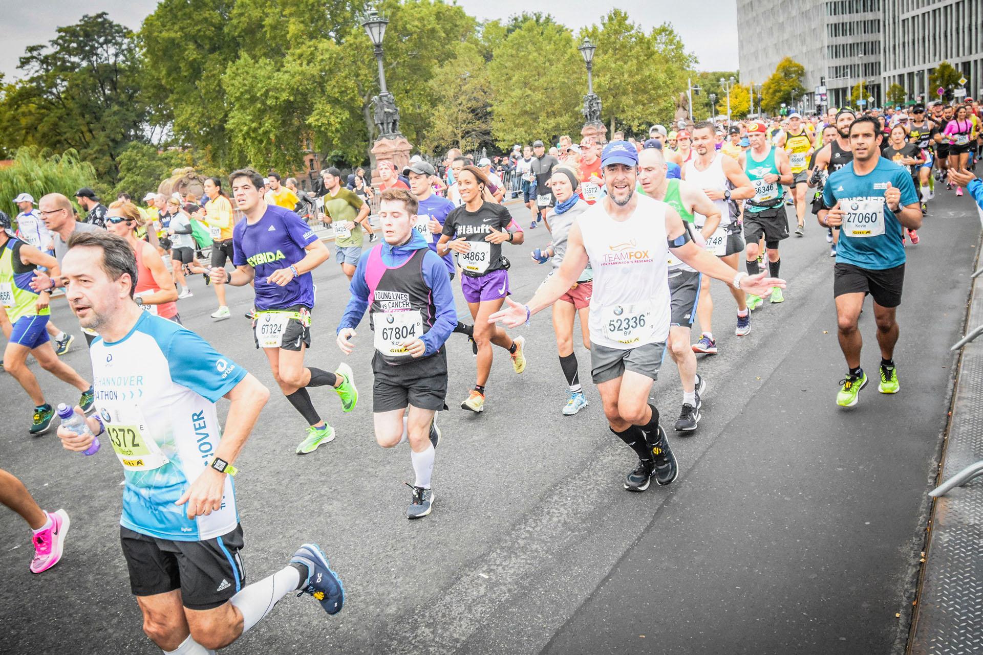 Wilmette resident Bill Bucklew, in the Team Fox tank top above, ran in the Berlin marathon on Sept. 29, 2019. Bucklew, who was diagnosed with Parkinson’s disease at age 43, will run in the Chicago marathon on Sunday, Oct. 13. (Courtesy of Bill Bucklew)