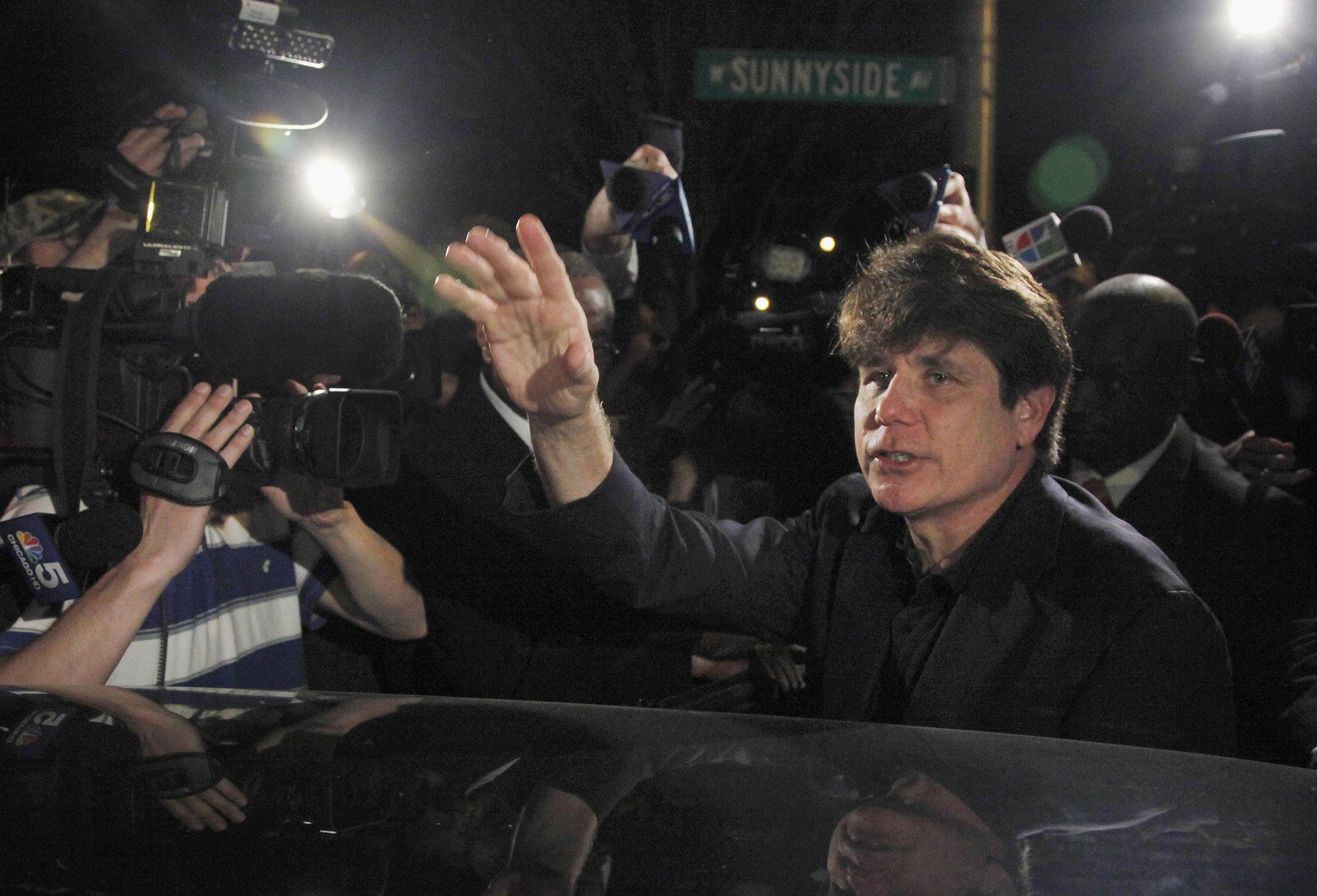 In this March 15, 2012 file photo, former Democratic Illinois Gov. Rod Blagojevich departs his Chicago home for Littleton, Colorado, to begin his 14-year prison sentence on corruption charges. (AP Photo / Charles Rex Arbogast, File)
