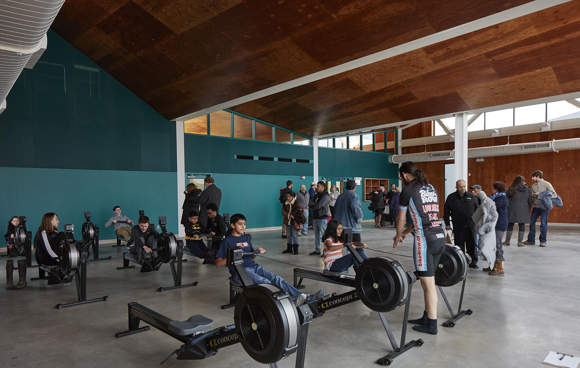 The new boathouse features a 5,800-square-foot heated training facility for rowers. (Tom Harris Photography / Studio Gang)