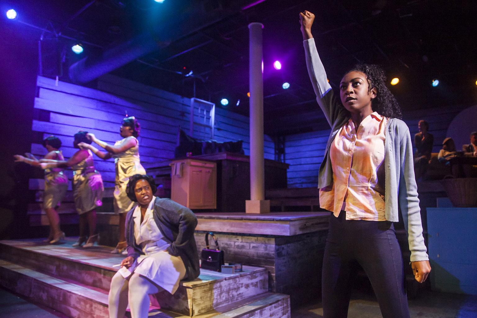 From left: Rashada Dawan and Bre Jacobs with, in background, Emma Sipora Tyler, De’Jah Jervai and Roberta Burke in Firebrand Theatre and TimeLine Theatre Company’s production of “Caroline, Or Change.” (Photo by Marisa KM) 