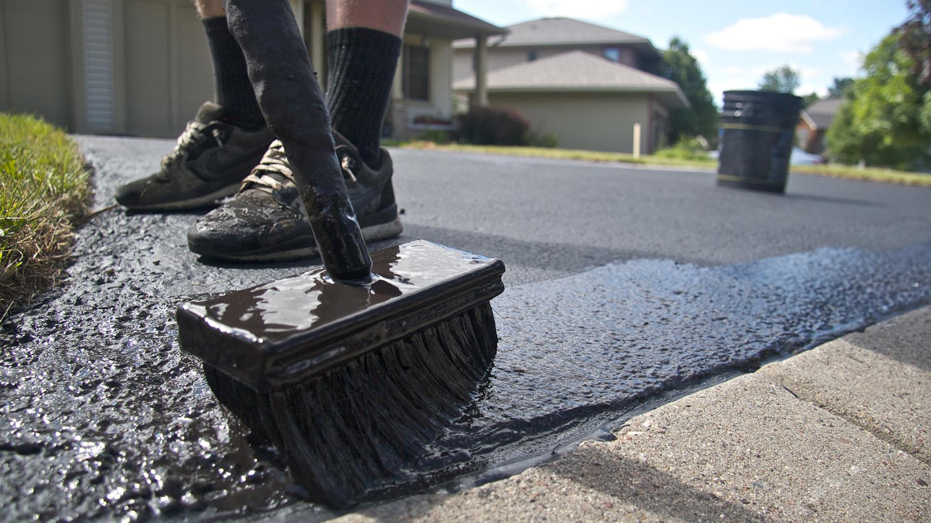 The Minnesota Legislature banned the sale and use of coal tar-based sealants on January 1, 2014. These products were commonly applied to asphalt driveways and parking lots. (MPCA Photos / Flickr)