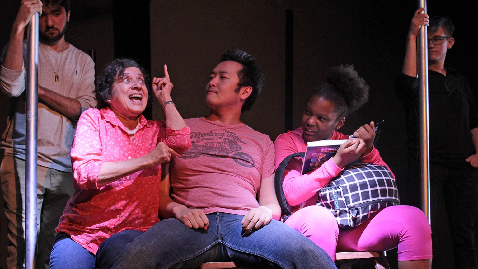 From left: Assistant stage manager Gabe Halsted-Alvarez, actors Joette Waters, Jian Zhang and Maya Hooks, and floor manager Sunniva Holmlund in “Manspread Madness,” one of seven short works about peace premiering as part of Collaboraction’s “Peacebook” Austin line-up. (Credit: Joel Maisonet)