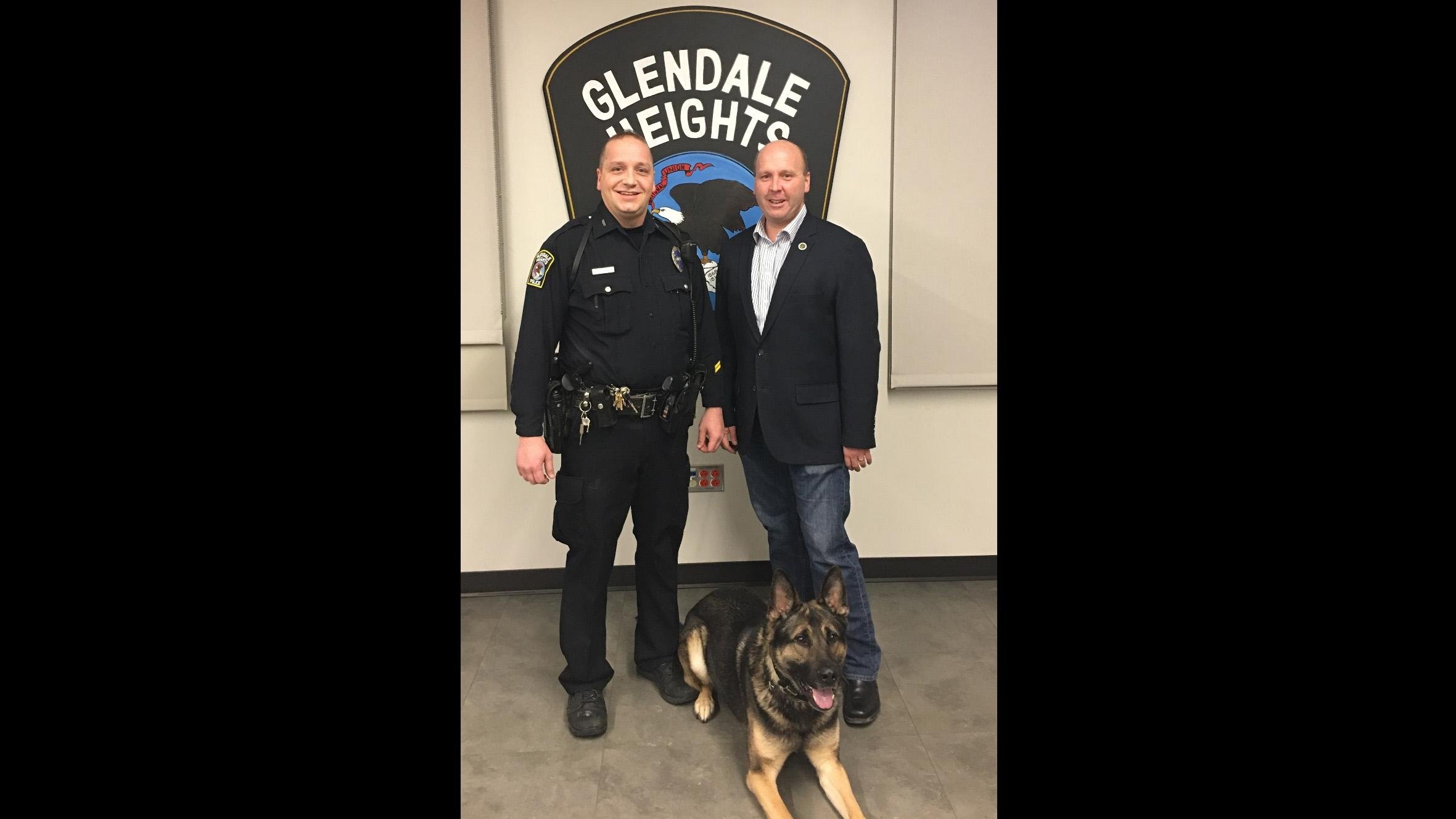 State Sen. Tom Cullerton, right, poses with Glendale Heights Police Officer Mike Huff and K9 Officer Orkan. (State Sen. Tom Cullerton)