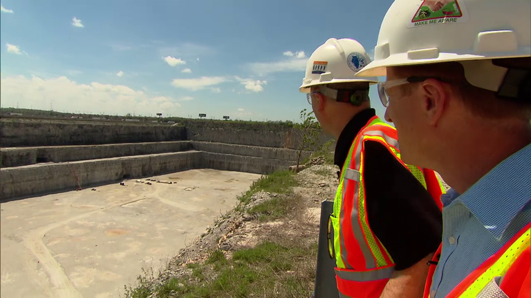 Jay Shefsky of "Chicago Tonight" surveys the Thornton Quarry in May 2015 with engineer Kevin Fitzpatrick of the Metropolitan Water Reclamation District of Greater Chicago.