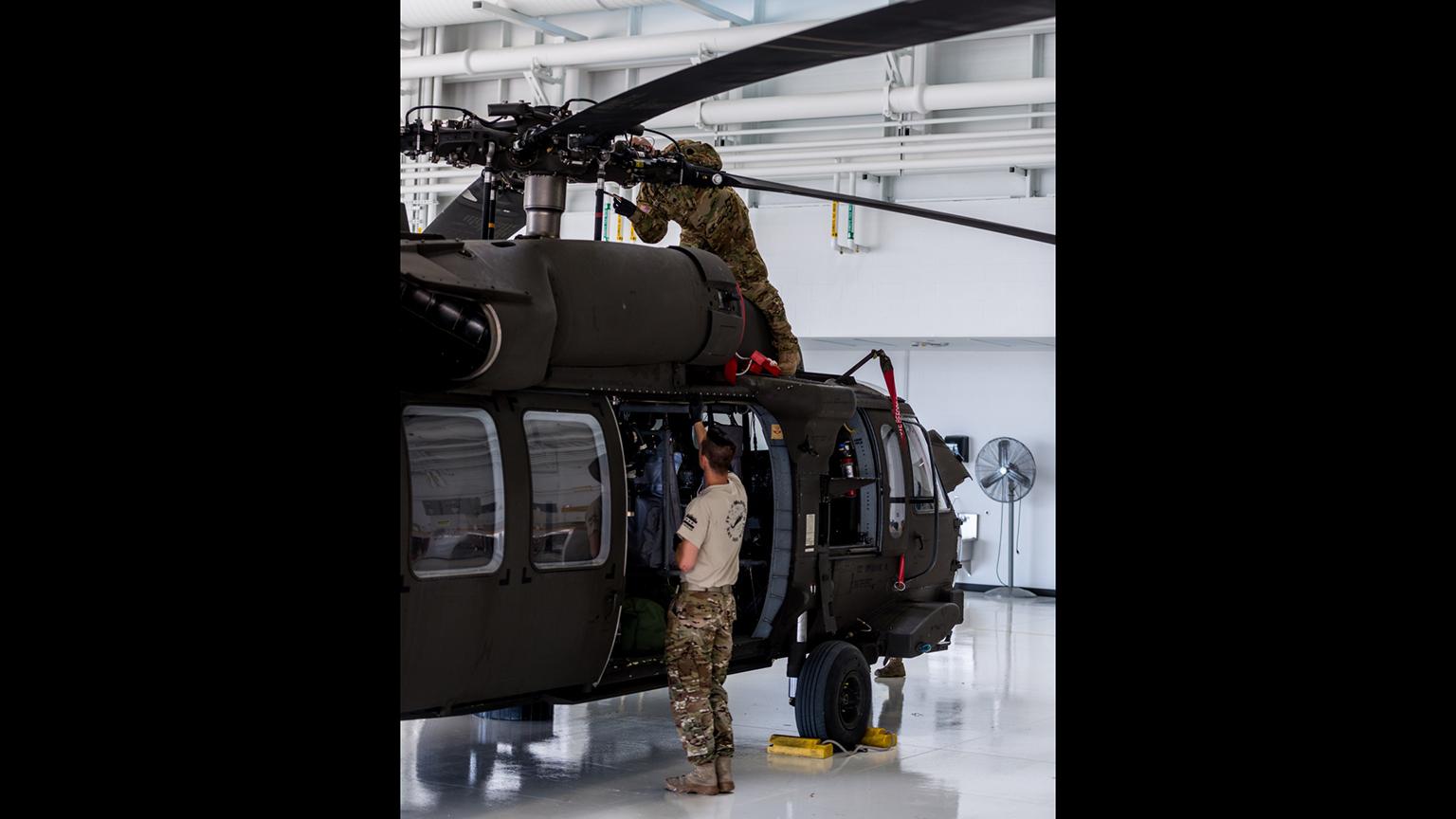 Illinois National Guard soldiers prepare a UH-60 Blackhawk to depart Kankakee in support of Hurricane Florence relief efforts. (Sgt. Stephen Gifford / Illinois National Guard)