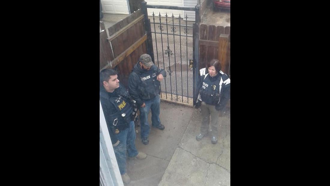 Berto Aguayo says this photo shows ICE agents wearing gear that says “police” outside a home in Chicago the week of March 27. (Courtesy of Berto Aguayo)