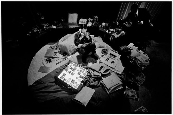 Hugh Hefner in his circular bed in 1966. (Burt Glinn)