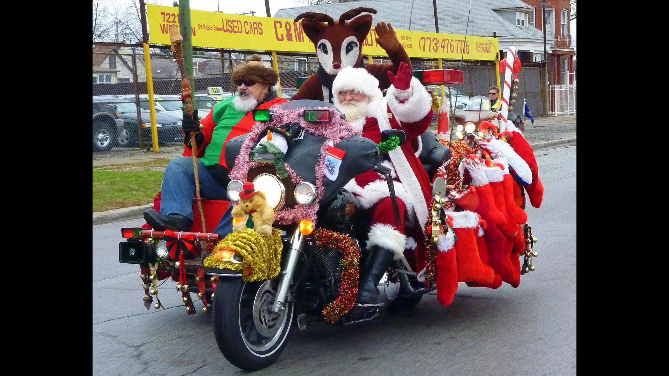 Santa swaps his sleigh for a motorcycle this weekend. Spot him along Western Avenue. (Jack Voss / Chicago Toys for Tots Motorcycle Parade)