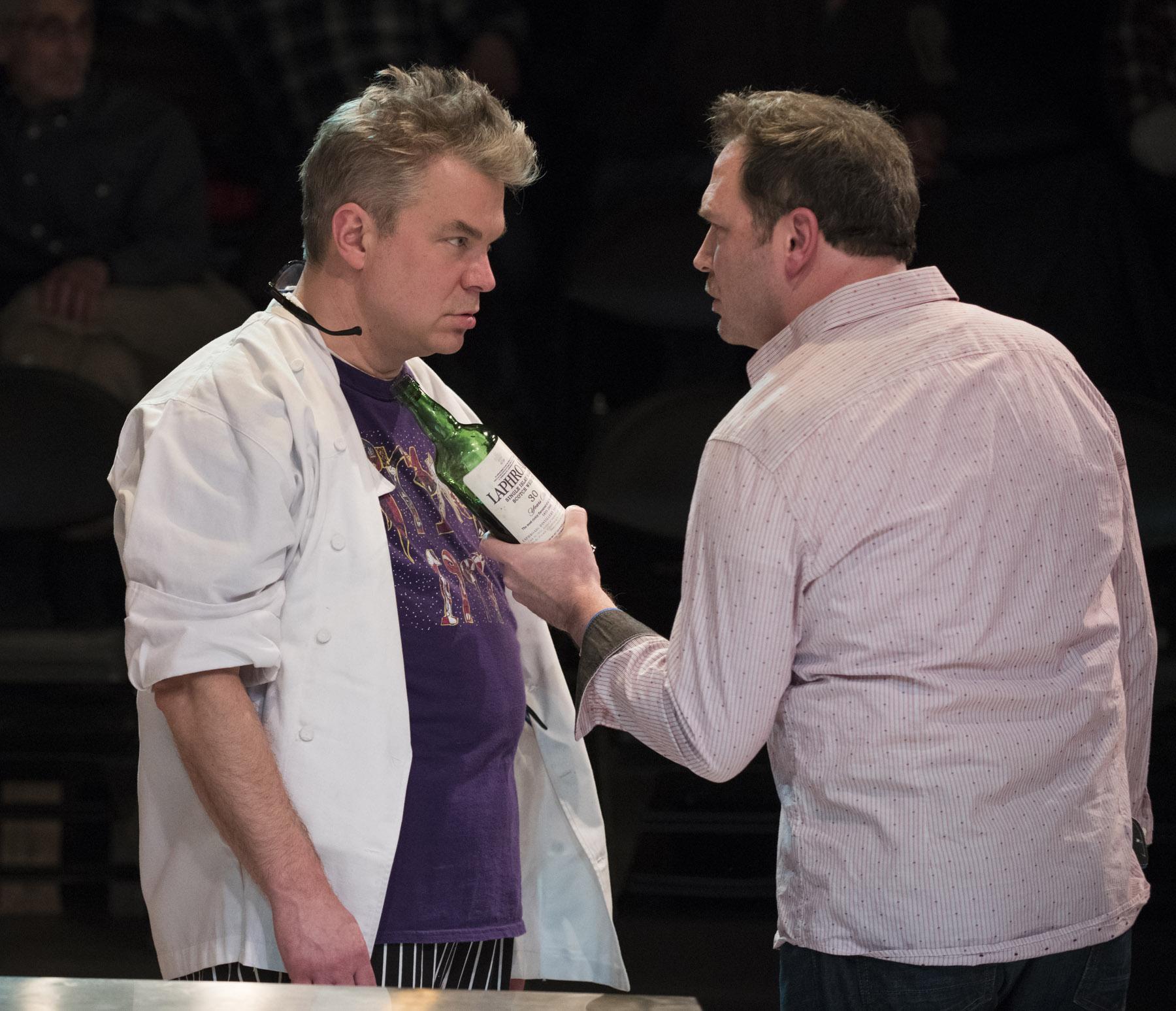 Peter DeFaria, left, and Brad Woodard in “How to Use a Knife.” (Photo by Michael Brosilow)