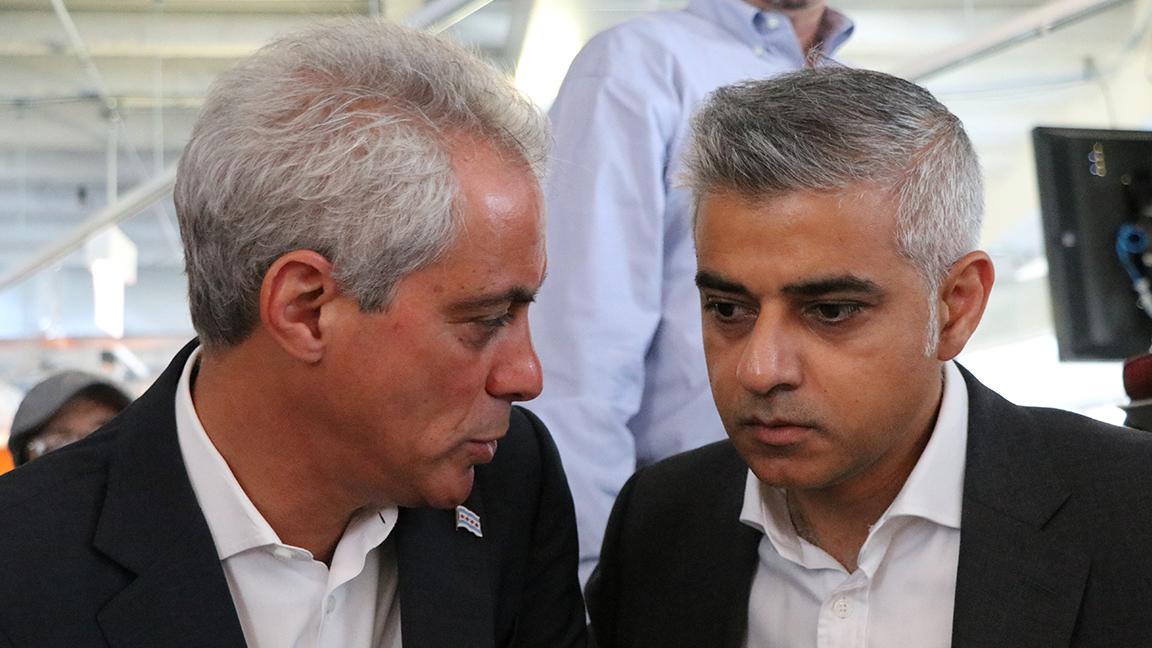 Chicago Mayor Rahm Emanuel speaks with Sadiq Khan, Mayor of London, after a panel discussion at tech hub 1871. (Evan Garcia / Chicago Tonight)