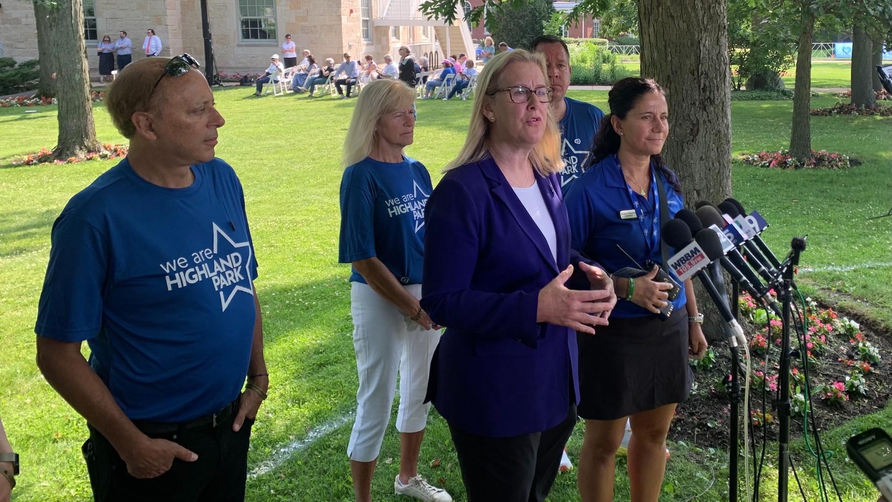 Highland Park Mayor Nancy Rotering speaks with the media before the town’s remembrance ceremony on July 4, 2023. (Eunice Alpasan / WTTW News)