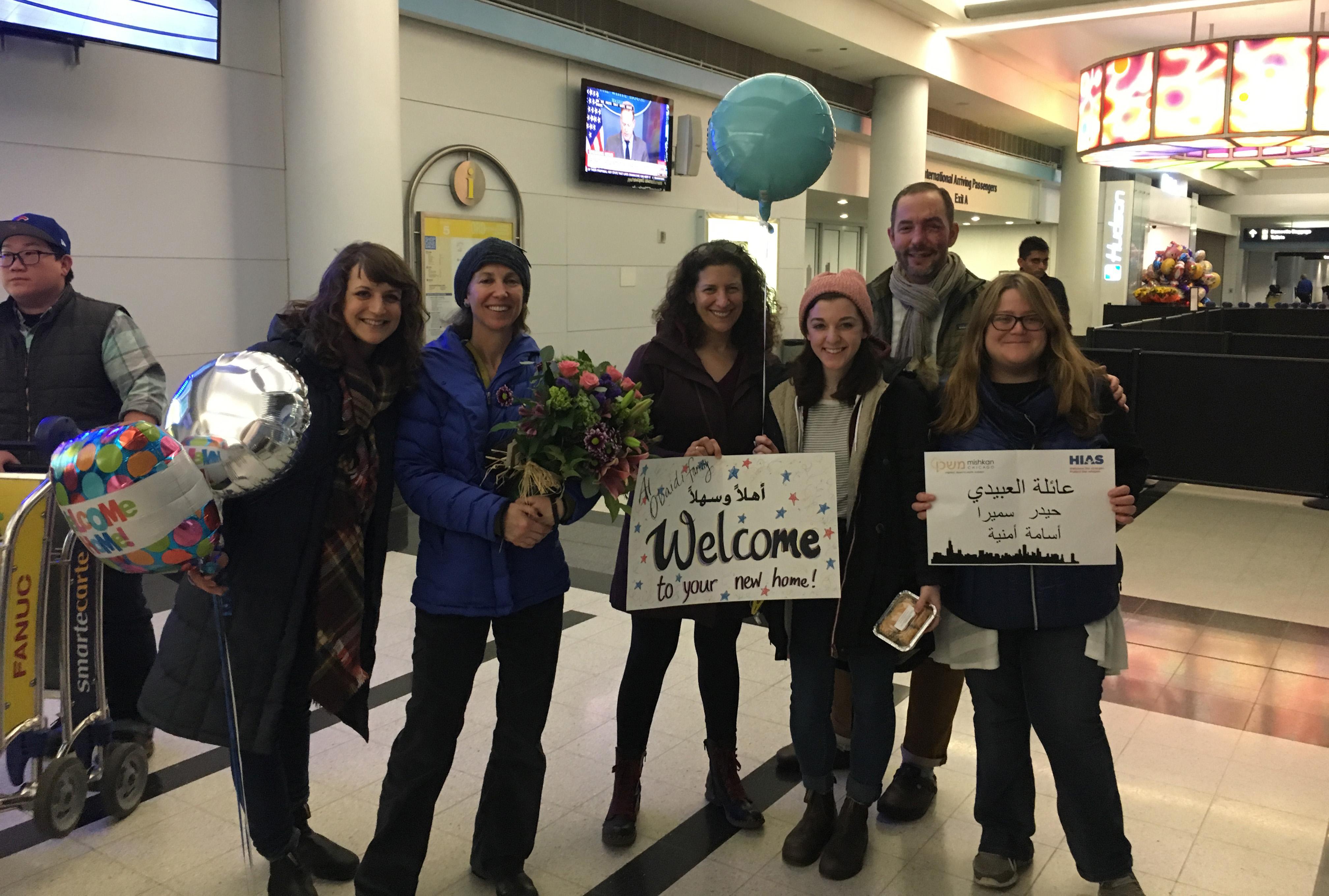 Members of Mishkan Chicago wait for the Al-Obaidis to arrive at O’hare on Jan. 24.