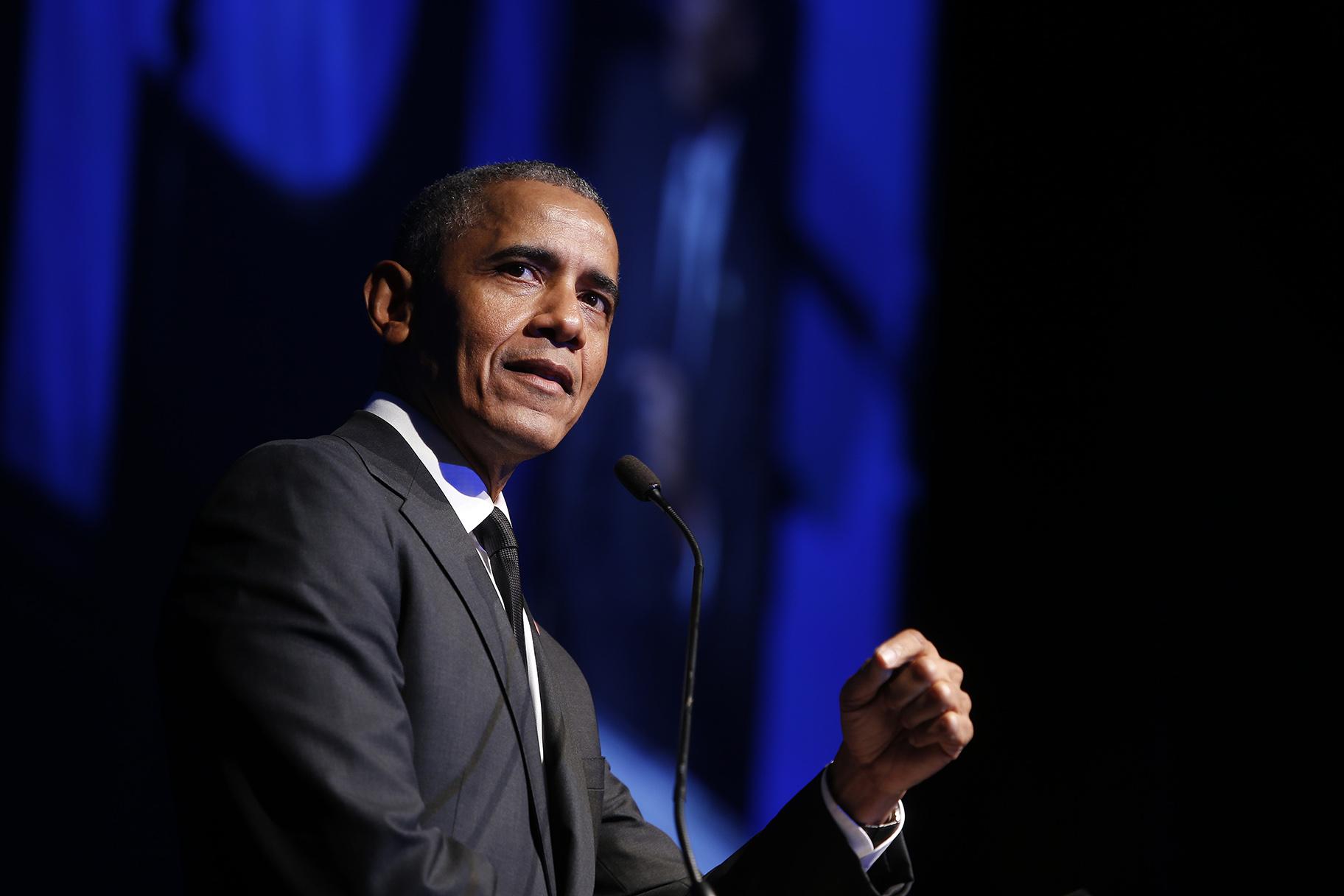 In this Dec. 12, 2018, file photo former President Barack Obama accepts the Robert F. Kennedy Human Rights Ripple of Hope Award at a ceremony in New York. (AP Photo / Jason DeCrow, File)