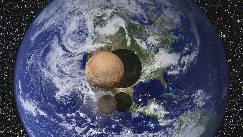 Graphic of Pluto and its moon, Charon, superimposed over Earth. 
