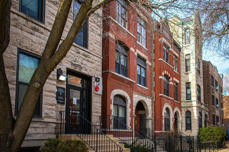 DePaul University is proposing to demolish these 130-year-old townhouses in order to make way for an athletic center. (Max Chavez / Preservation Chicago)