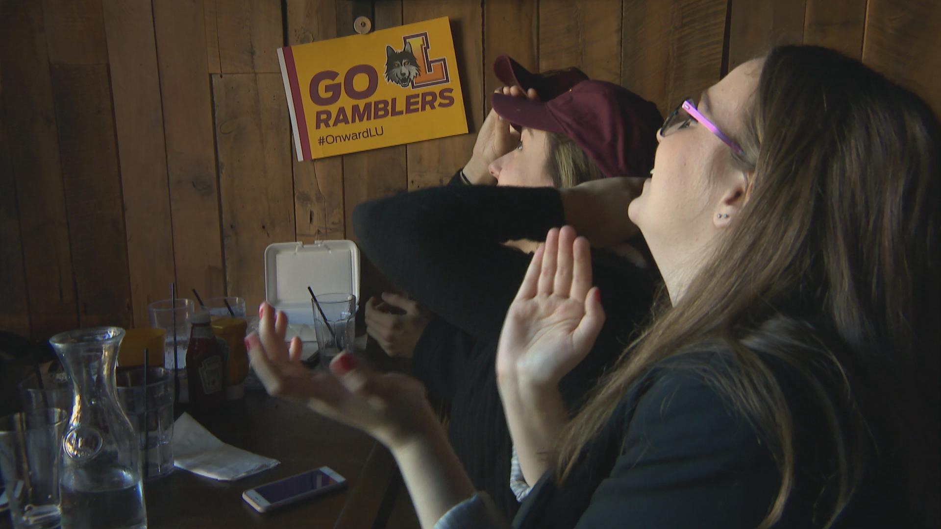 Loyola Ramblers fans cheer on the team at in Rogers Park bar Bruno’s on Thursday, March 15, 2018.