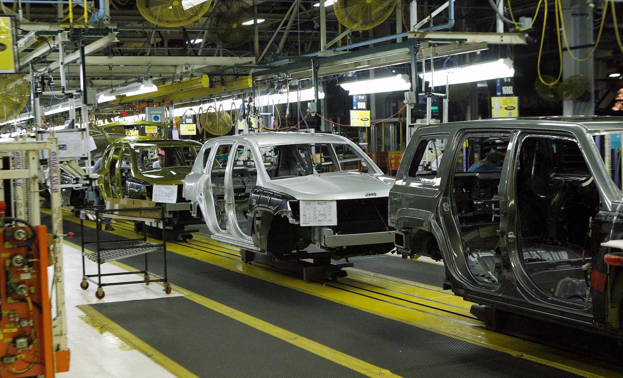 Jeep Compass and Patriot vehicles move down an assembly line during a tour of the Chrysler Belvidere Assembly plant in Belvidere, Illinois, in 2012. (Reuters) 