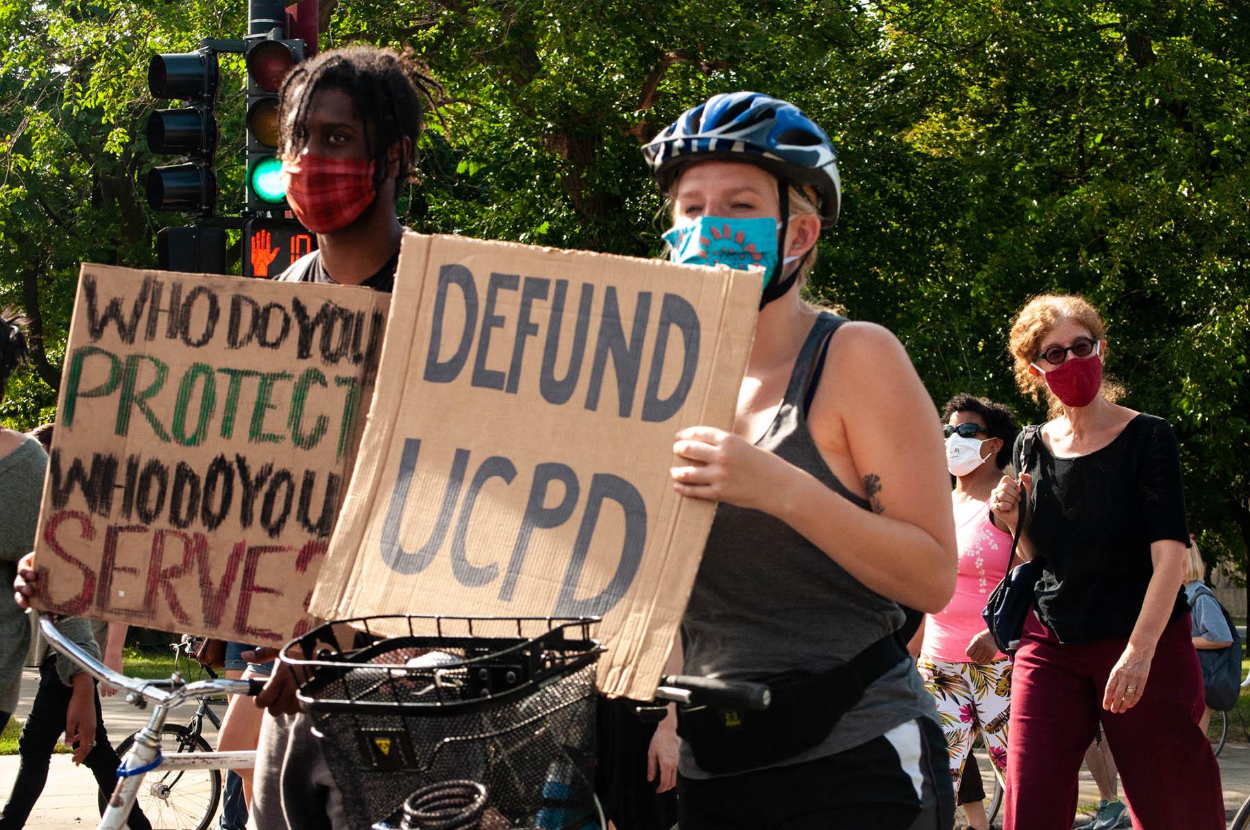 Activists in support of defunding the University of Chicago Police Department participate in a march on Saturday, Aug. 29, 2020. (Grace Del Vecchio / WTTW News)