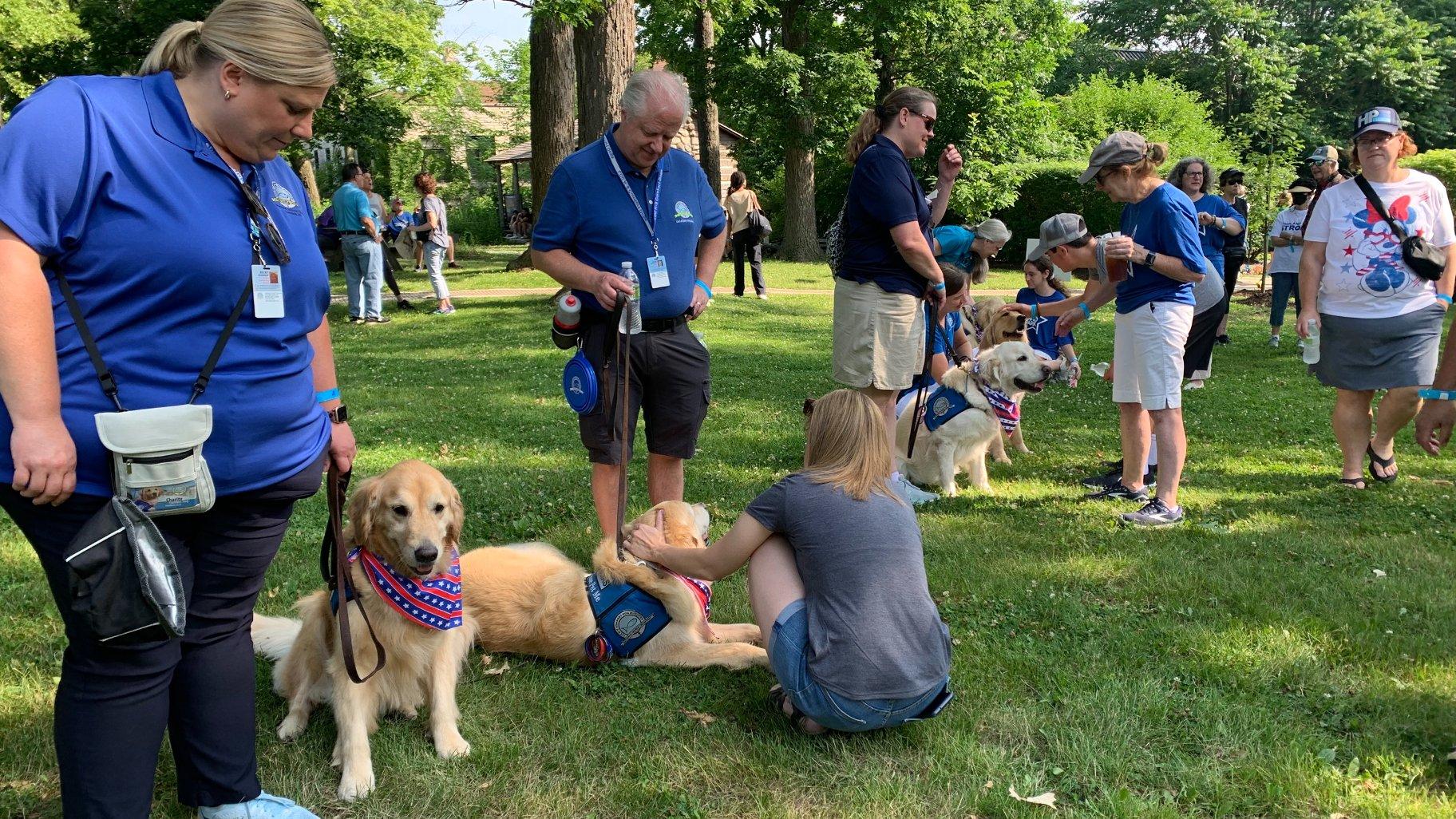 Support dogs were on hand at the Highland Park remembrance ceremony and walk on July 4, 2023. (Eunice Alpasan / WTTW News)