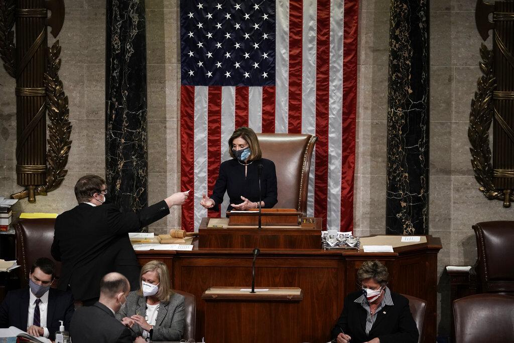 Speaker of the House Nancy Pelosi, D-Calif., leads the final vote of the impeachment of President Donald Trump, for his role in inciting an angry mob to storm the Congress last week, at the Capitol in Washington, Wednesday, Jan. 13, 2021. (AP Photo / J. Scott Applewhite)