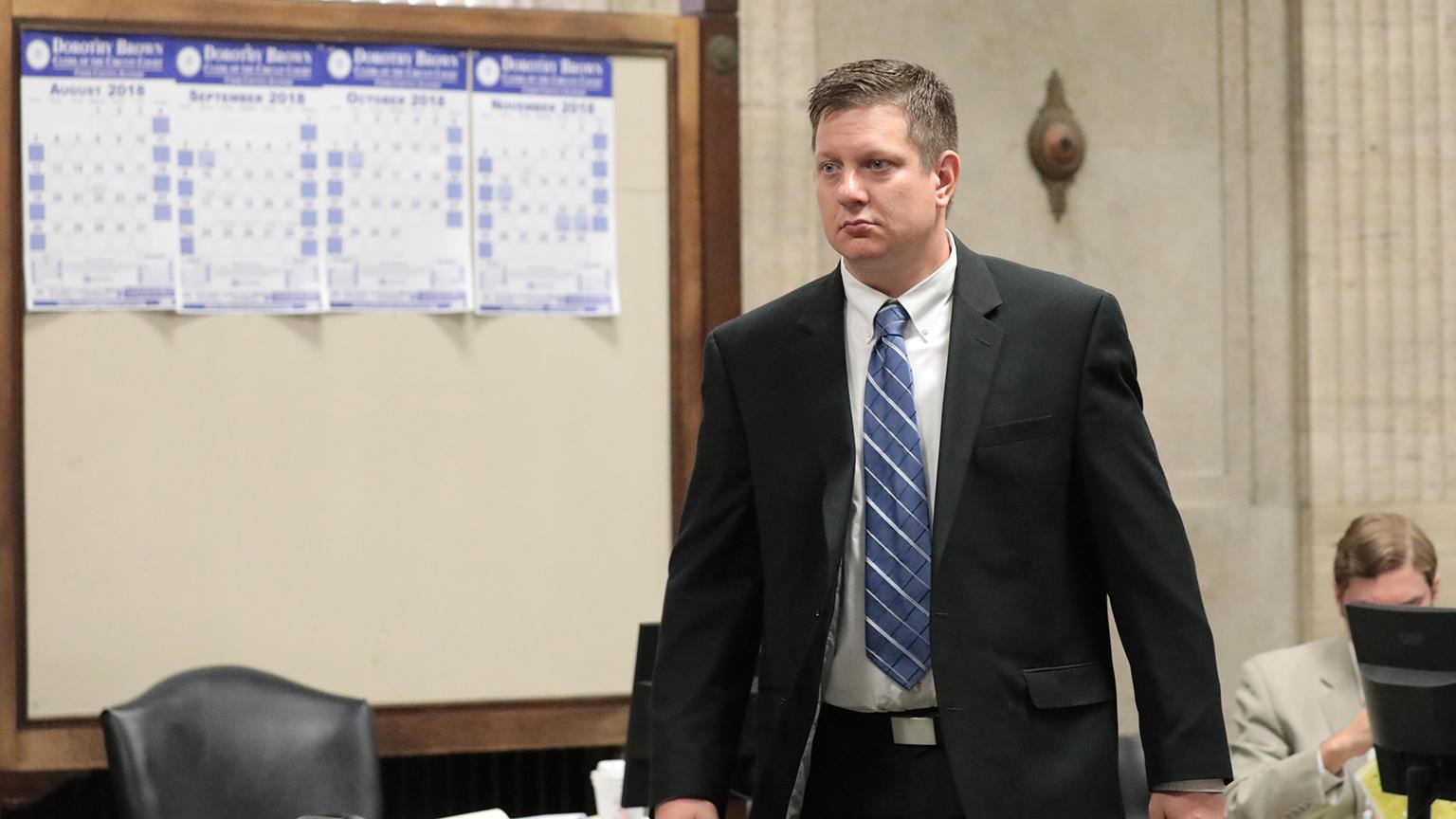 Chicago police Officer Jason Van Dyke approaches the judge’s bench at a hearing for the shooting death of Laquan McDonald, at the Leighton Criminal Court Building on Wednesday, Aug. 15, 2018. (Antonio Perez / Chicago Tribune / Pool)