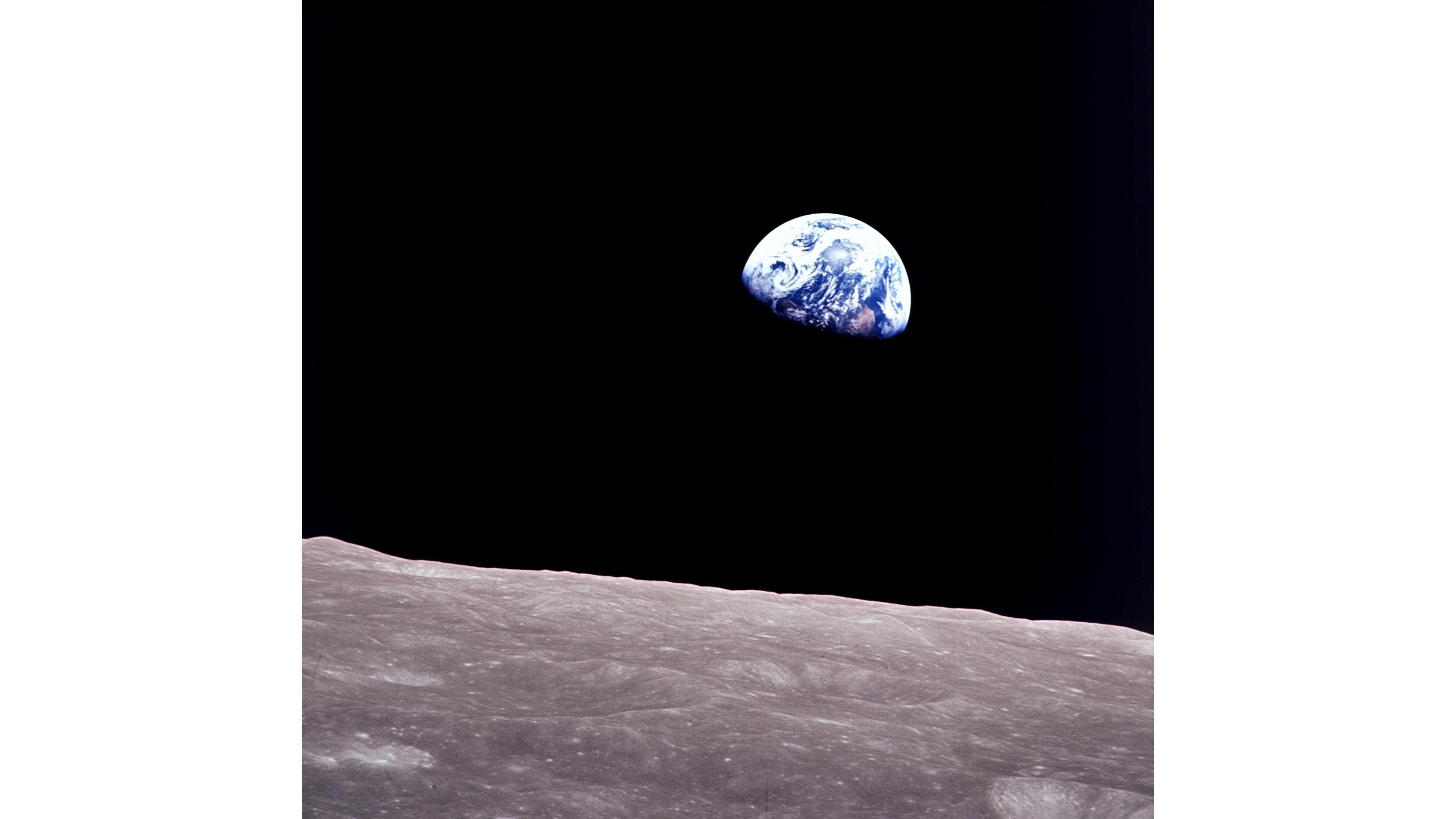 Taken aboard Apollo 8 by Bill Anders, this iconic picture shows Earth peeking out from beyond the lunar surface as the first crewed spacecraft circumnavigated the Moon.
