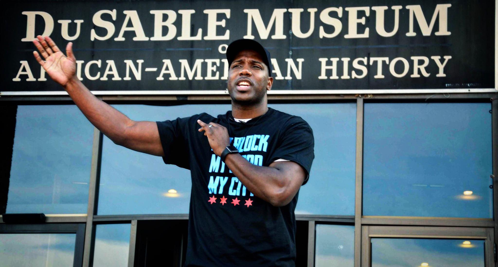Jahmal Cole speaks at the DuSable Museum of African-American History in February. More than 400 people showed up to learn about his organization. Cole was expecting 100. (Courtesy of Jahmal Cole)