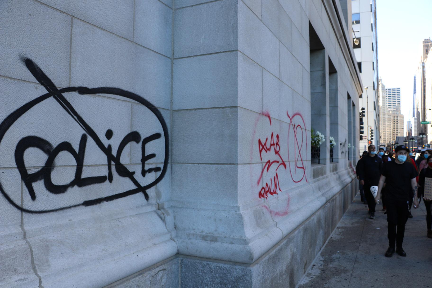 Graffiti was spray-painted throughout the protest route, which covered large parts of the Loop. (Evan Garcia / WTTW News)