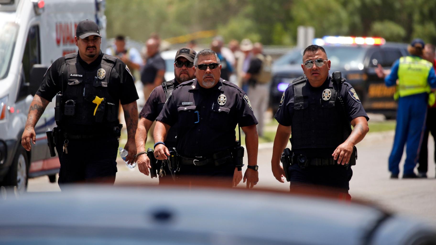 Police walk near Robb Elementary School following a shooting, Tuesday, May 24, 2022, in Uvalde, Texas. (AP Photo / Dario Lopez-Mills)