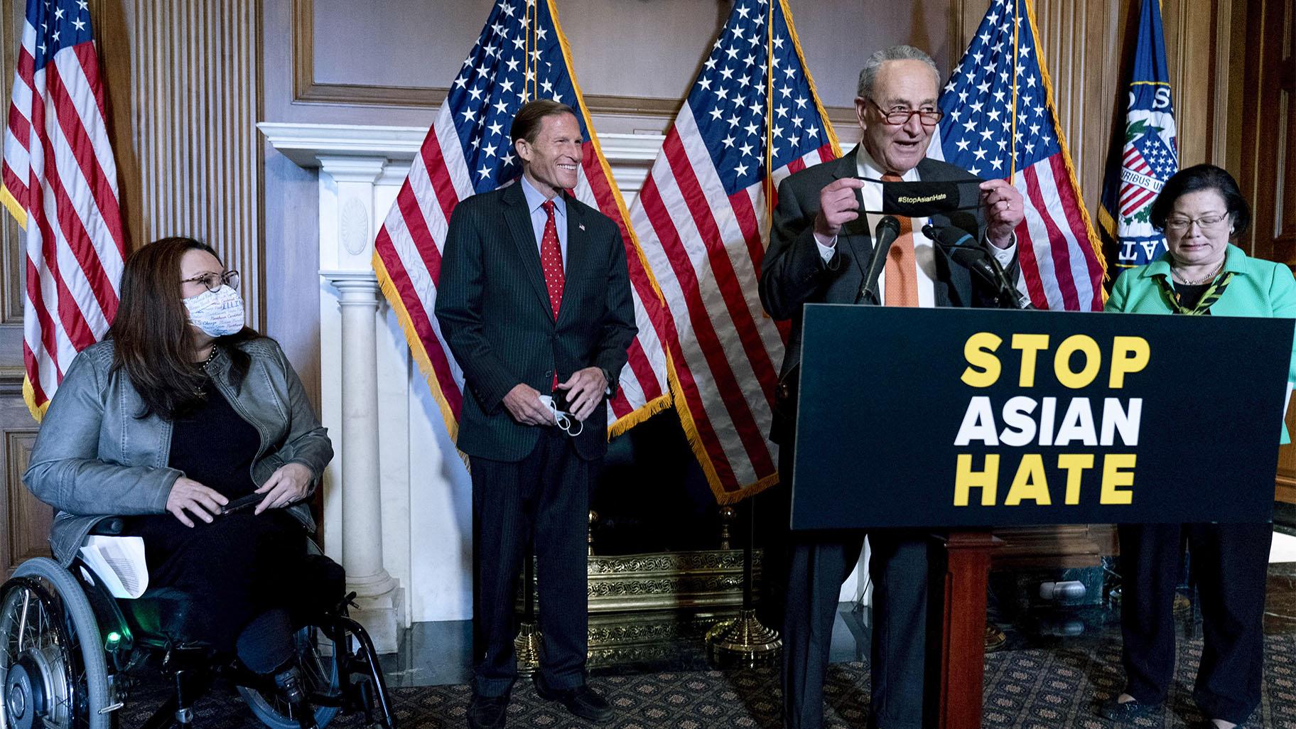 Senate Majority Leader Chuck Schumer of N.Y., accompanied by Sen. Mazie Hirono, D-Hawaii, Sen. Tammy Duckworth, D-Ill., and Sen. Richard Blumenthal, D-Conn., speaks at a news conference after the Senate passed a COVID-19 Hate Crimes Act on Capitol Hill, Thursday, April 22, 2021, in Washington. (AP Photo / Andrew Harnik)