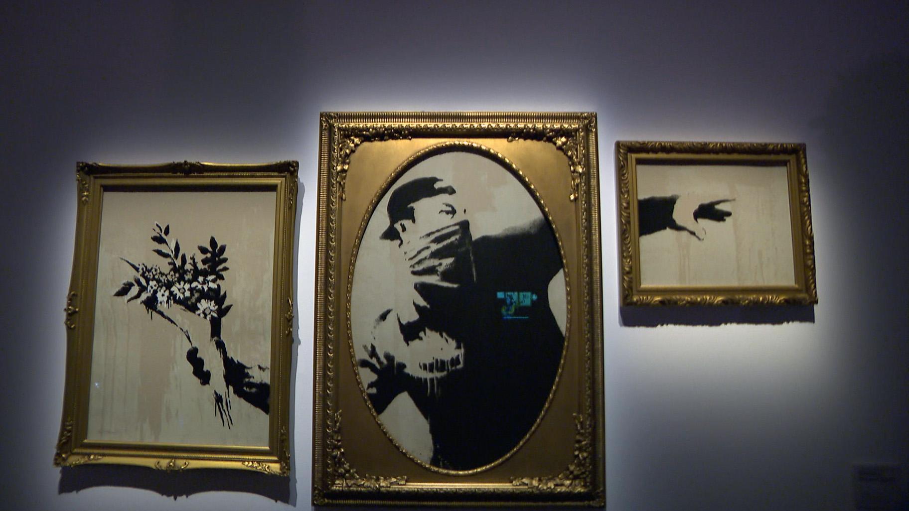 “Flower Thrower” is one of many recognizable work featured in “The Art of Banksy.” (WTTW News)