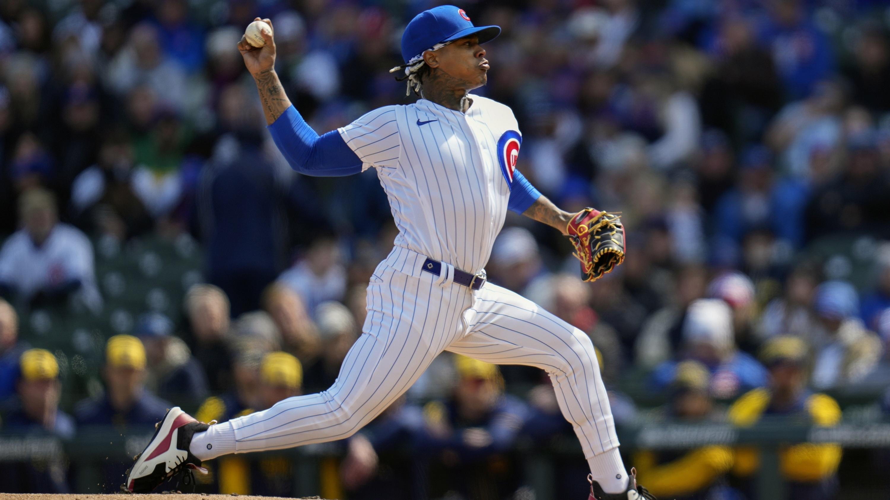 Chicago Cubs starting pitcher Marcus Stroman throws during the first inning of a baseball game against the Milwaukee Brewers Thursday, March 30, 2023, in Chicago. (AP Photo/Erin Hooley)