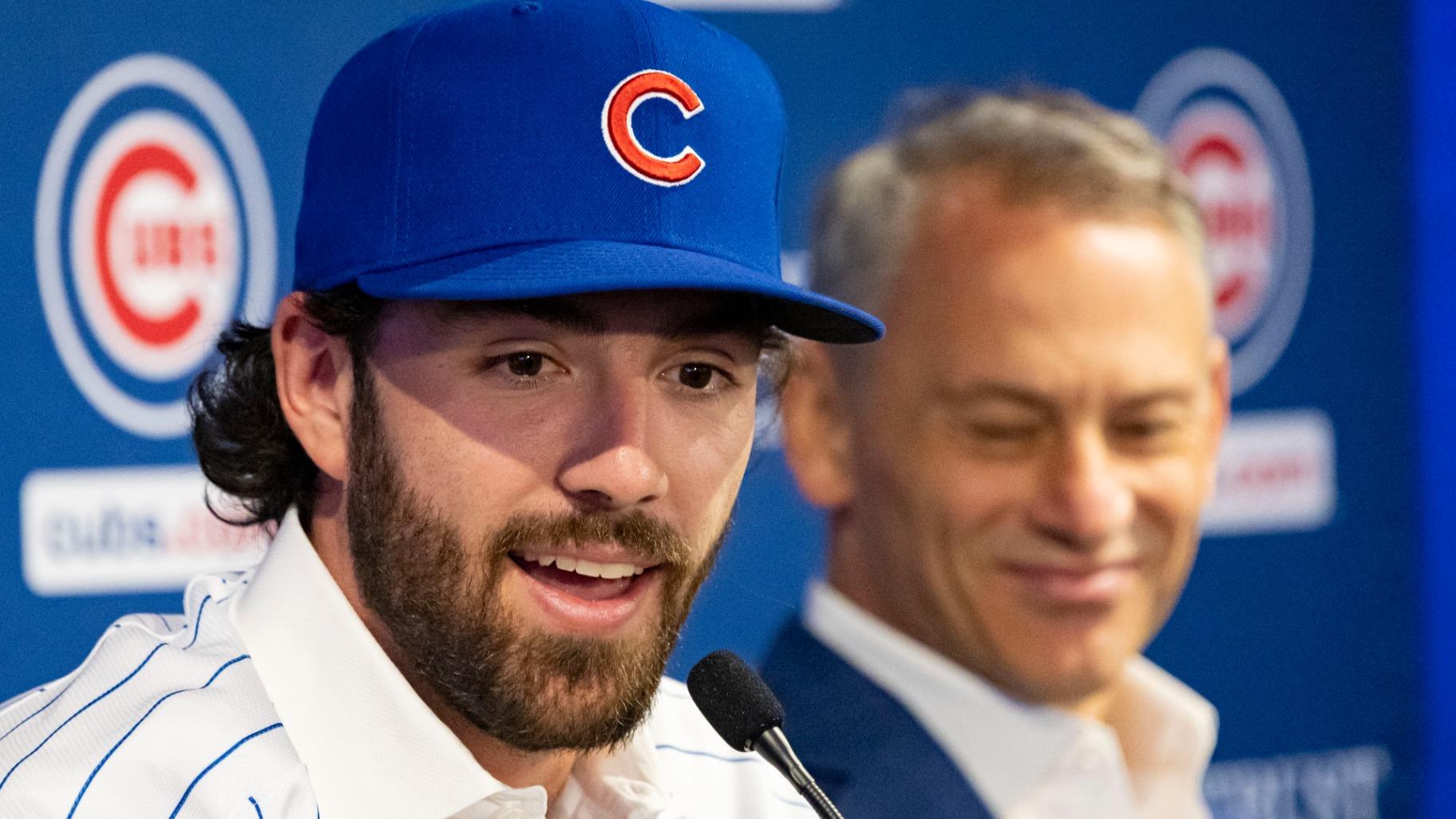 All-Star shortstop Dansby Swanson, alongside Jed Hoyer, Chicago Cubs president of baseball operations, speaks during baseball press conference Wednesday, Dec. 21, 2022, at Wrigley Field in Chicago. (Brian Cassella / Chicago Tribune via AP)