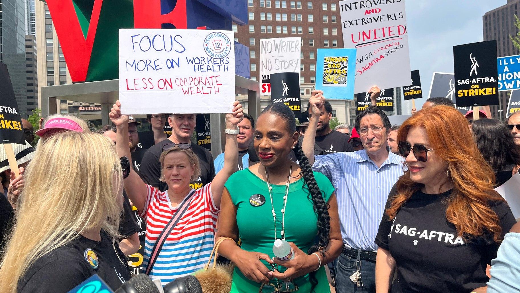 Actors Sheryl Lee Ralph, left, and Lisa Ann Walter, members of the cast of “Abbott Elementary,” participate in a rally in support of the actors and writers strikes at Love Park in Philadelphia on Thursday, July 20, 2023. (AP Photo / Tassanee Vejpongsa)
