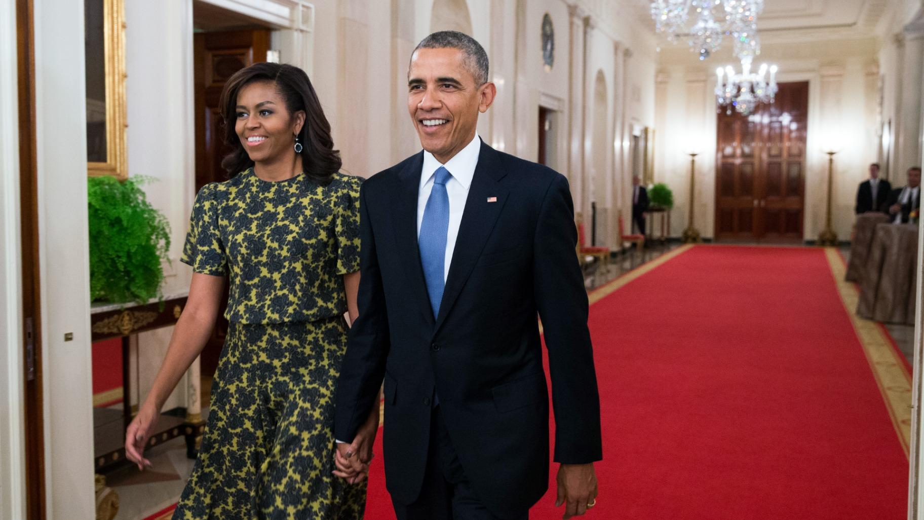 First lady Michelle Obama, and President Barack Obama arrive for the Presidential Medal of Freedom ceremony in the East Room of the White House, on Tuesday, Nov. 24, 2015, in Washington. (AP Photo / Evan Vucci, File)