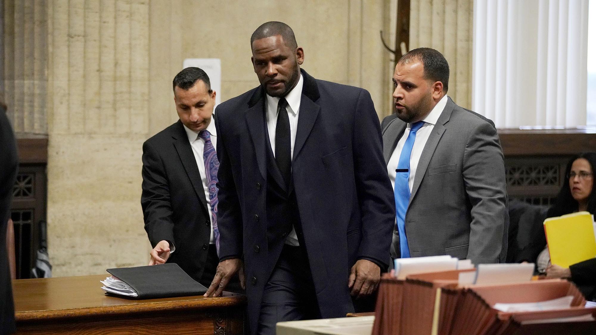 On Monday night, the final installment of “Surviving R. Kelly” began airing on Lifetime. R. Kelly, (C), here appears at a hearing in 2019 in Chicago, Illinois. (E. Jason Wambsgans / Getty Images)
